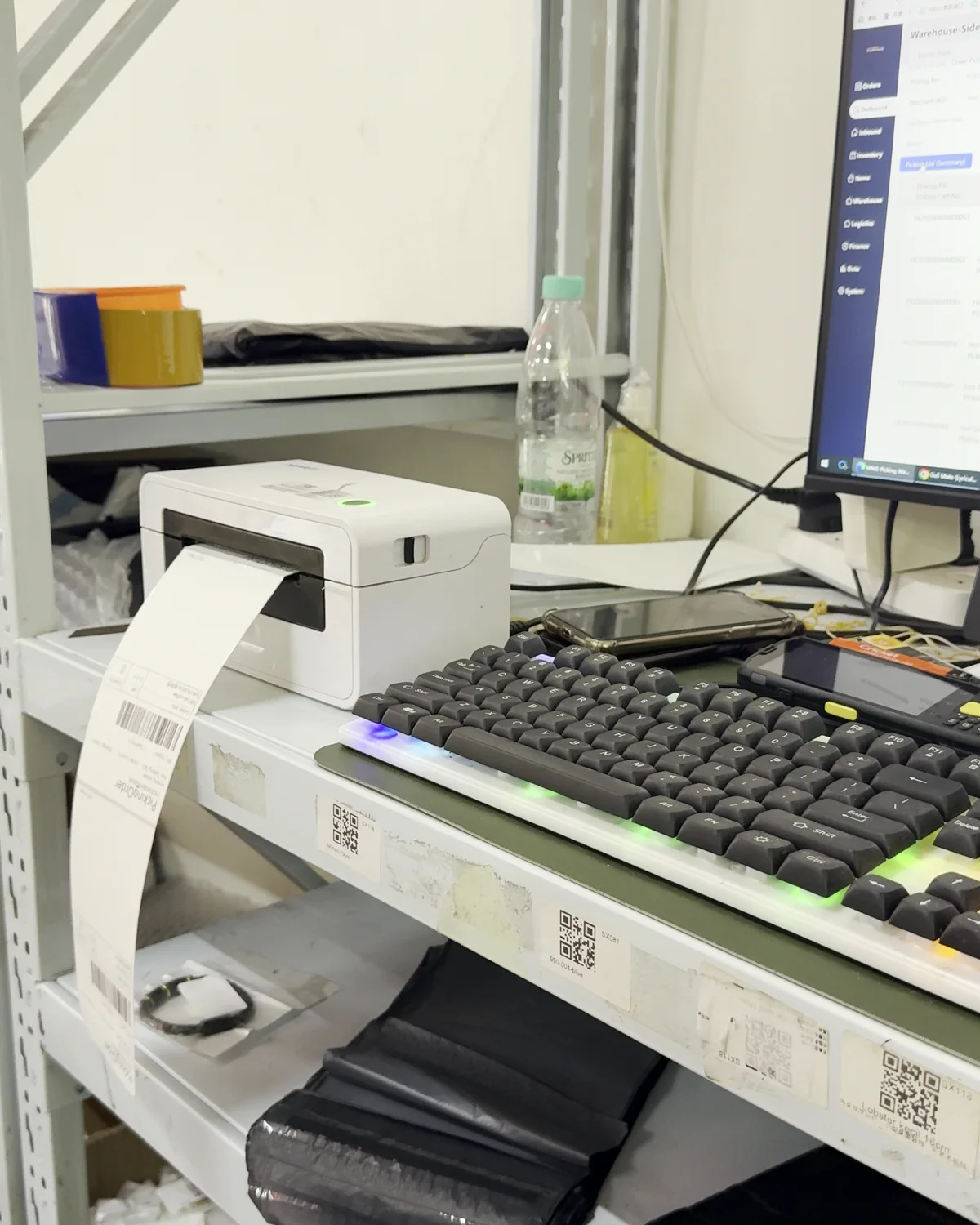 RunningBear Malaysia warehouse system and label-printing workstation
